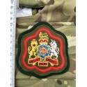 Шеврон Warrant Officer Class 1(Уорент-офицер 1 класса. Прапорщик) олива. красная полоса. на чёрном.
